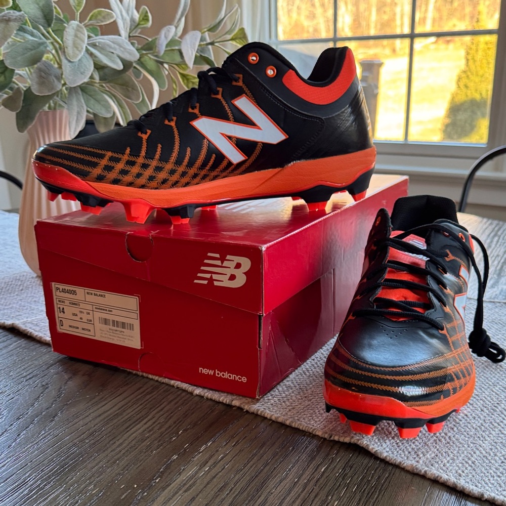 New Balance Adult Black and Orange Cleats
